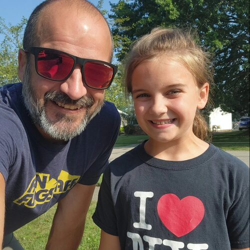 Coach Tim with his daughter after a run